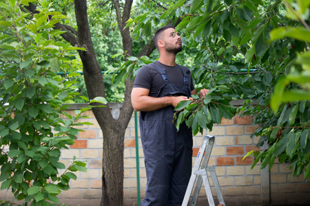 young worker in garden