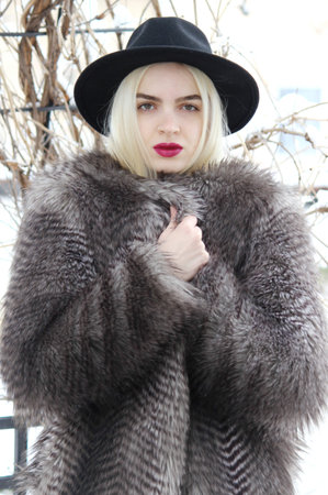 beautiful blonde woman winter portrait