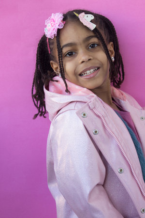 Portrait of cute little multiracial girlの写真素材