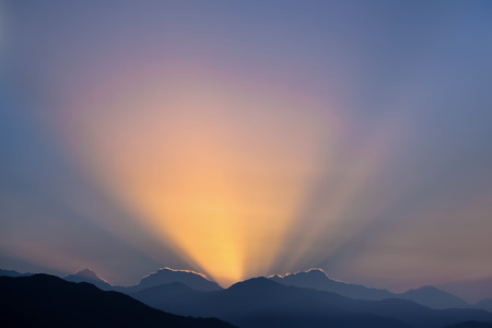 Beautiful first sunrays are visible in the vast sky.の写真素材