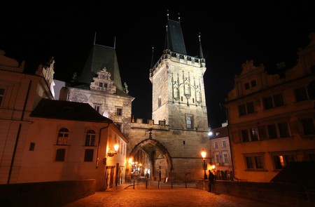 On Charles Bridge in Prague at Nightの写真素材