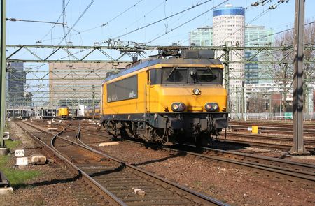 Locomotive leaving the railway stationの写真素材