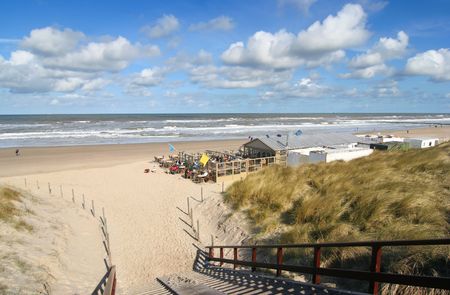 Stairs across the dunes leading to a beach clubの写真素材
