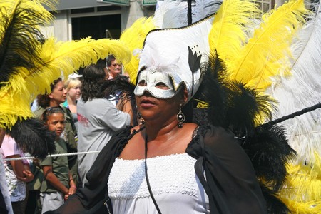 ROTTERDAM - SUMMER CARNIVAL, JULY 26, 2008. Masked carnival dancer in the parade at the Caribbean Carnival in Rotterdam.のeditorial素材