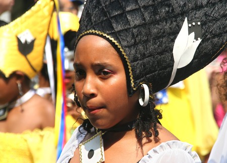 ROTTERDAM - SUMMER CARNIVAL, JULY 26, 2008. Child in the carnival parade at the Caribbean Carnival in Rotterdam.のeditorial素材