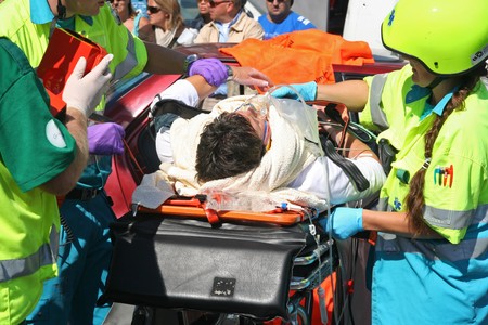 ROTTERDAM, HOLLAND - SEPTEMBER 5, 2010: Demonstration of handling of car crash victim by medics at the annual World Harbor Days in Rotterdam, Holland on September 5のeditorial素材