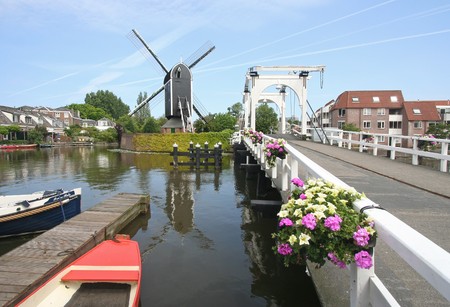 Wind mill and drawbridge in Leiden, Hollandの写真素材