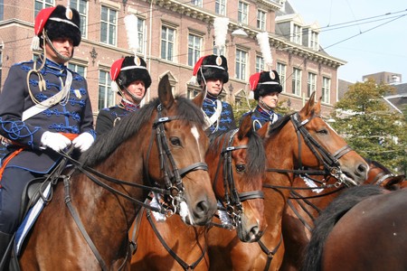 THE HAGUE, HOLLAND - SEPTEMBER 21, 2010: Cavalry riding at the Parliament on Prinsjesdag (annual presentation of Government Policy to Parliament by the Queen) in The Hague, Holland on september 21のeditorial素材