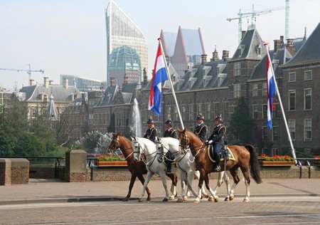 THE HAGUE, HOLLAND - SEPTEMBER 21, 2010: Cavalry riding at the Parliament on Prinsjesdag (annual presentation of Government Policy to Parliament by the Queen) in The Hague, Holland on september 21のeditorial素材