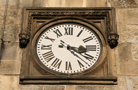 Ornamental clock with Roman numerals on Prague City Hallの写真素材