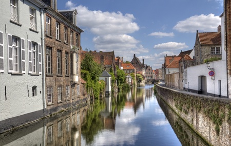 Quiet canal in the old part of Bruges, Belgiumの写真素材