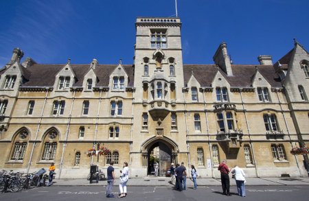 Oxford, UK - July 24, 2011: Tourists stand in front of Balliol College in Oxford, UK on July 24, 2011.のeditorial素材