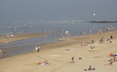 People on the beach at Scheveningen, Hollandのeditorial素材