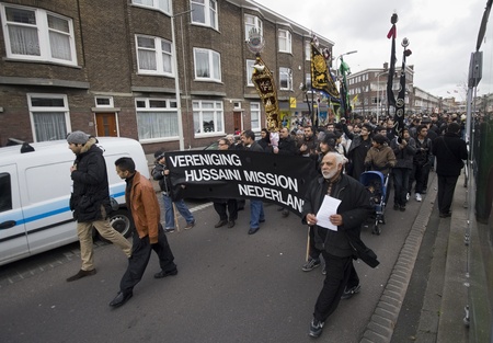 THE HAGUE, HOLLAND - DECEMBER 5: Shiite muslims walk in the parade of the Ashura festival on December 5, 2011 in The Hague, Hollandのeditorial素材