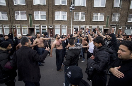 THE HAGUE, HOLLAND - DECEMBER 5: Shiite muslims practice self-flagellation in the parade of the Ashura festival on December 5, 2011 in The Hague, Hollandのeditorial素材