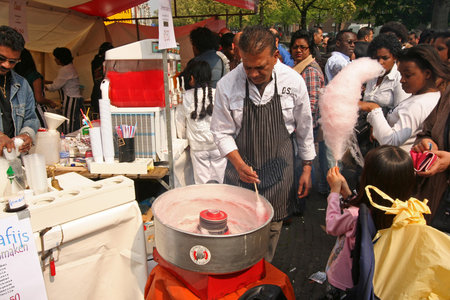 Making Sugar Candy on an outdoor festival in The Hague, Hollandのeditorial素材