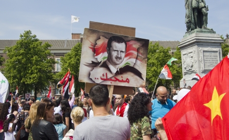 THE HAGUE, HOLLAND - MAY 19: Syrians demonstrate for Syria and Assad in the center of The Hague, Holland on May 19, 2012のeditorial素材
