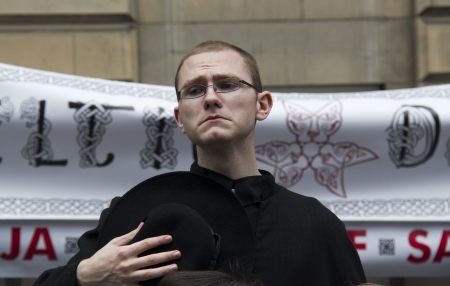 EDINBURGH, UK: AUGUST 2: Performer plays a priest on the Edinburgh Festival Fringe in Edinburgh, UK on August 2, 2012のeditorial素材