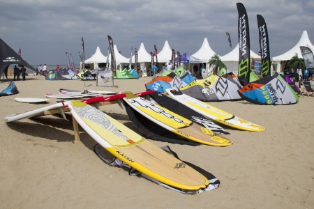 SCHEVENINGEN, HOLLAND - MAY 20: Kite surf camp with surfboards on the beach at the World Cup Kite Surfing in Scheveningen, Holland on May 20, 2012.のeditorial素材