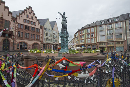Frankfurt, Germany - April 28, 2014  Colored ribbons tied by children around the statue in the old town square in central Frankfurt, Germany on April 28, 2014のeditorial素材