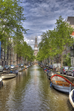 Canal and church tower in Amsterdam, Hollandのeditorial素材
