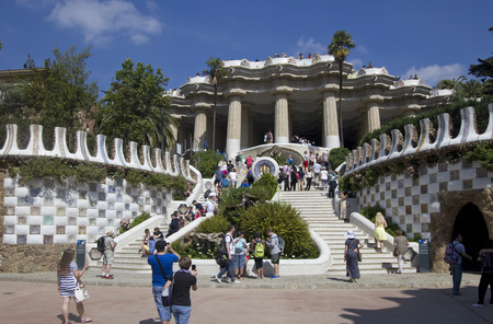 Barcelona, Spain - May 26, 2015: People walk in front of the entrance to the Guell park created by Gaudi, on May 26, 2015 in Barcelona, Spainのeditorial素材