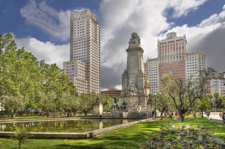 Madrid, Spain - May 29, 2016: Tourists take pictures of the monument to Cervantes on the Plaza de Espana in Madrid, Spain on May 29, 2016のeditorial素材