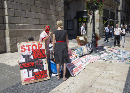 Barcelona, Spain - May 22, 2015: People at an anti-bullfighting stand in Placa Jaume in Barcelona, Spain on May 22, 2015.のeditorial素材