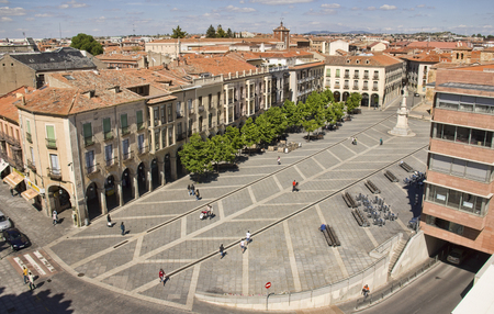 Avila, Spain - May 31, 2016: People walk on the Plaza de Santa Teresa de Jesus with surrounding buildings in Avila, Spain on May 31, 2016のeditorial素材