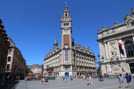 Lille, France - May 26, 2017: People walk on the Place de Theatre square in front of the Opera and Stock Exchange building in Lille, France on May 26, 2017のeditorial素材