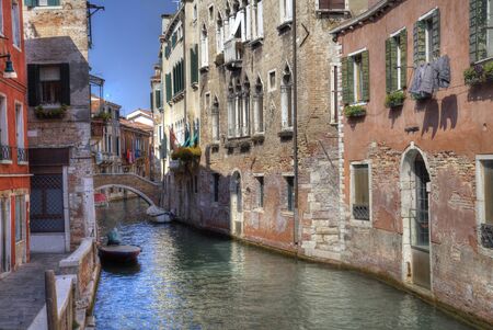 Canal and historical buildings in Venice, Italyの写真素材