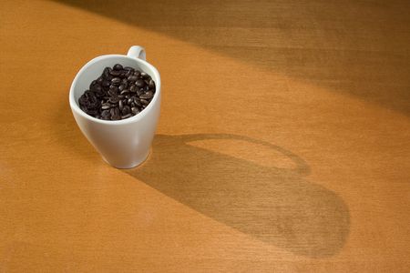 Coffee cut full of coffe beansの写真素材