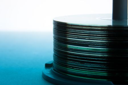 Stack of cd's witha blue hueの写真素材