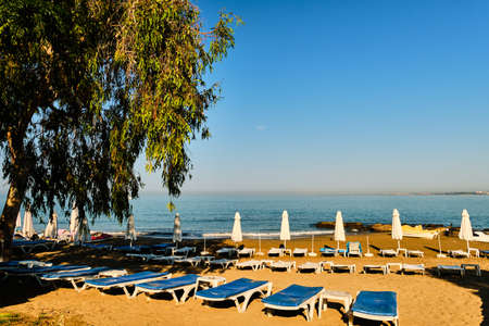 Beach with sand, sunbeds and umbrellas in Side, Manavgat, Turkeyの写真素材