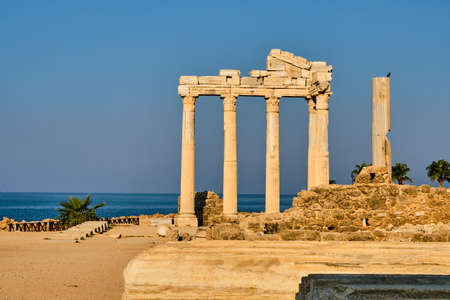 Beautiful antic Appollo temple in town Side in Turkey in the morningの写真素材