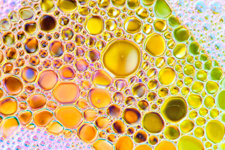 Beautiful multicolored soap and oil colorful bubbles macro abstract detailの写真素材