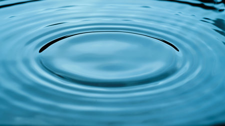 Rippled water surface in cyan crolor - silence abstract - with copy space