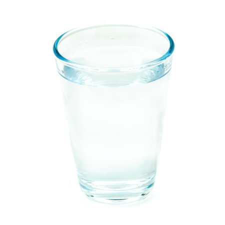 Fresh water in glass isolated on white backgroundの写真素材
