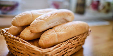 Tasty czech bakery products rolls in box on wooden deskの写真素材