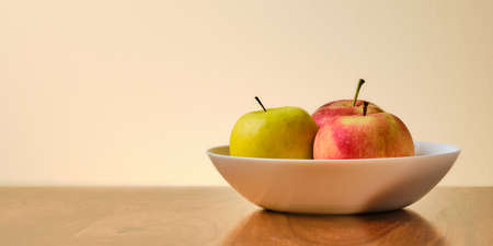 Still life with green and red apples with copy spaceの写真素材