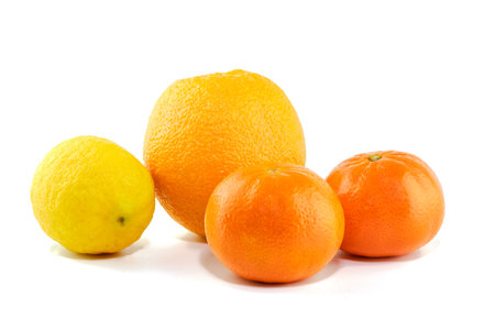 Tasty lemon, orange and tangerine fruit isolated on white backgroundの写真素材