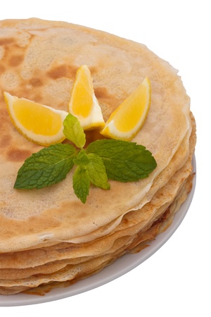 A crepe is a type of very thin pancake. It is very popular in France. Crepe may contain a variety of fillings. It can serve as main meal or a dessert. Image is isolated on white background, contains clipping path.の写真素材