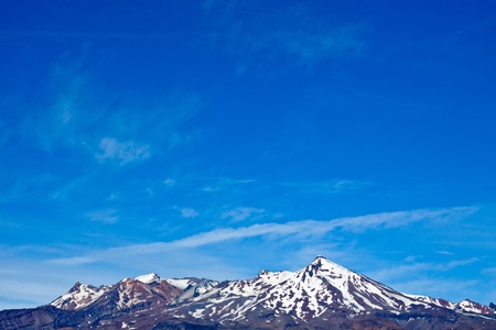 Mountain and blue sky - large copy space. Mount Ruapehu the highest point in the North Island, Tongariro National Park - New Zealand.の写真素材