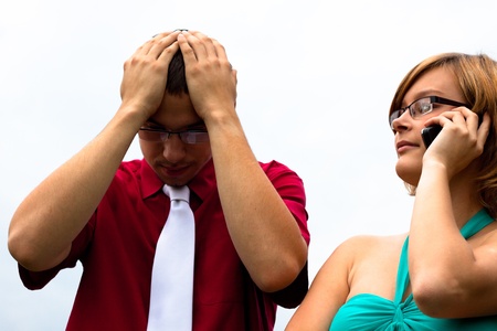 Portrait of two young frustrated people.の写真素材