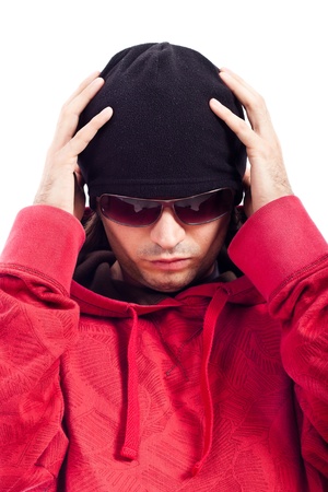 Detail of Hip Hop dancer in red hoody, black hut and sunglasses.の写真素材