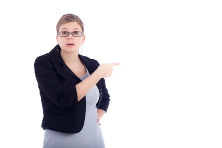 Angry young business woman blaming, isolated on white background.の写真素材