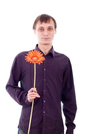 Single man holding flower, isolated on white background.の写真素材