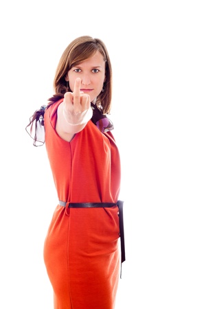Young woman rude gesturing with middle finger, isolated on white background.の写真素材