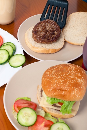 Detail of kitchen table and preparation of homemade hamburgers.の写真素材