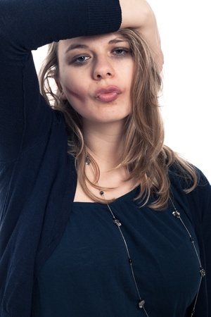 Portrait of young drunk woman flirting face, isolated on white background.の写真素材
